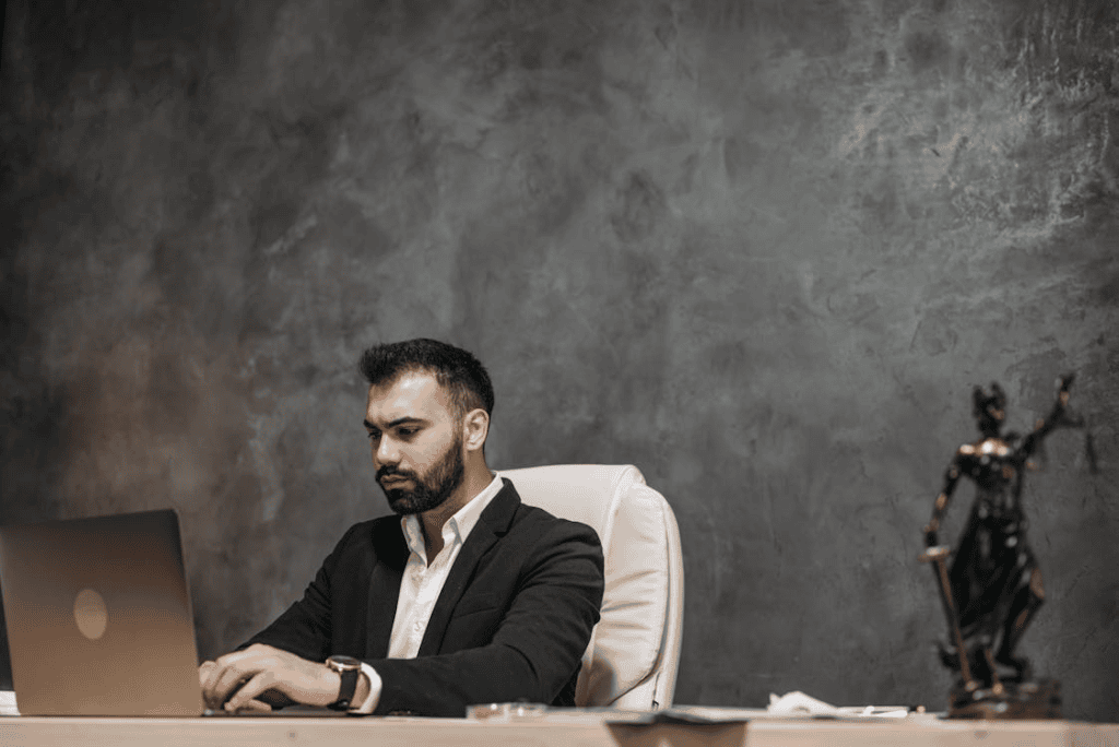 Legal professional using laptop