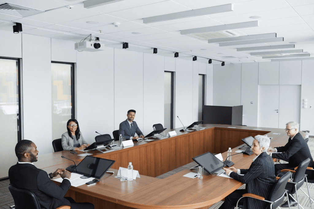 people sitting at conference table