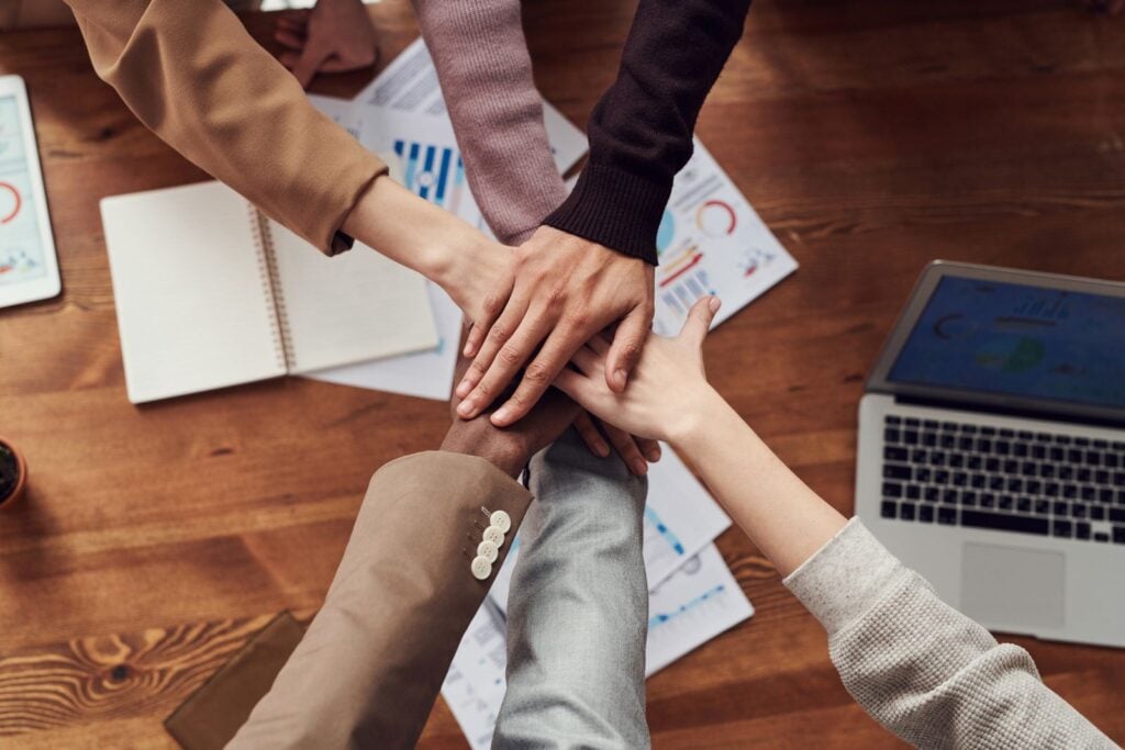 Recruiter shaking hands with legal candidate